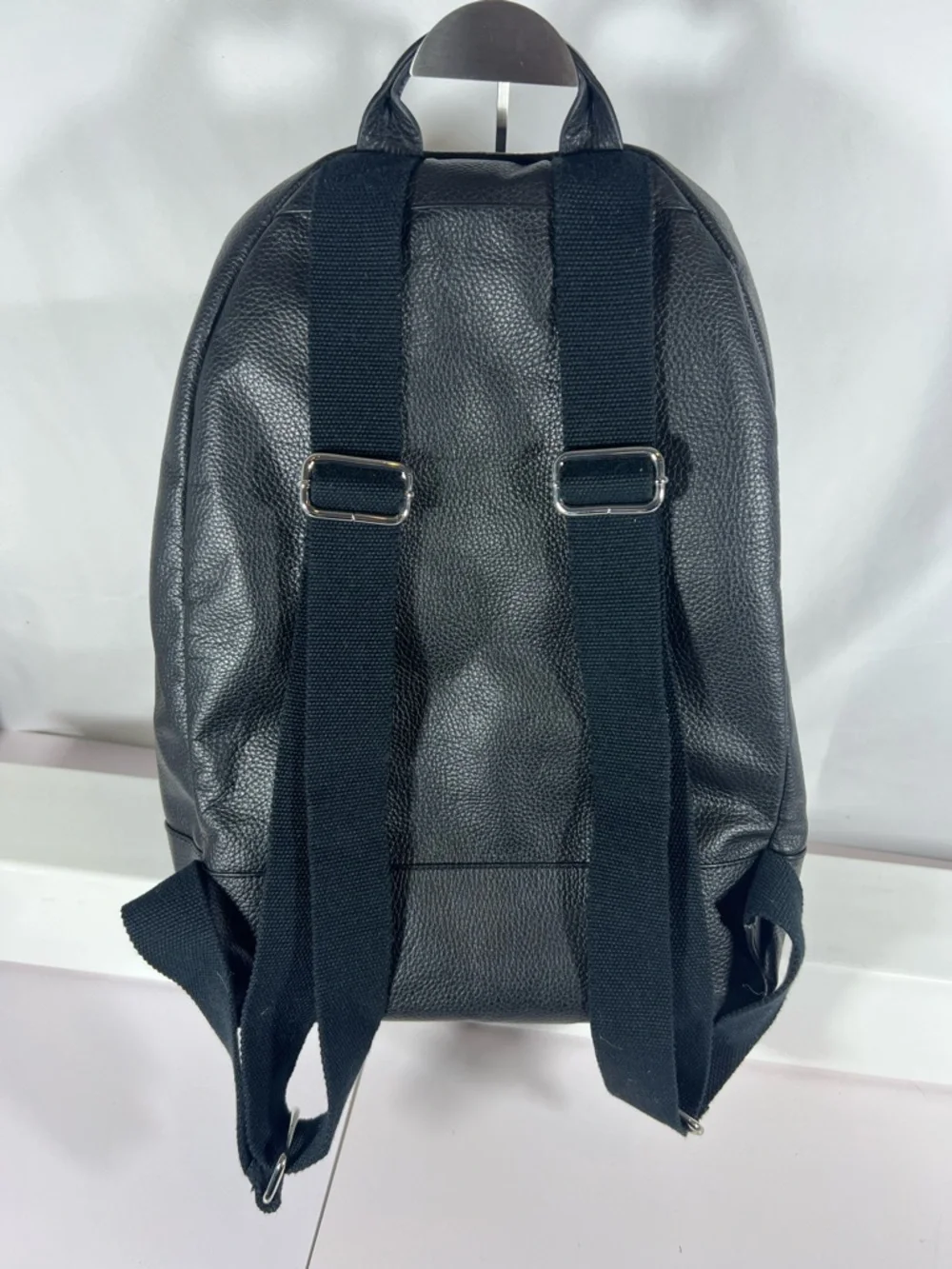 4063: Cole Haan Black Pebbled Leather Backpack